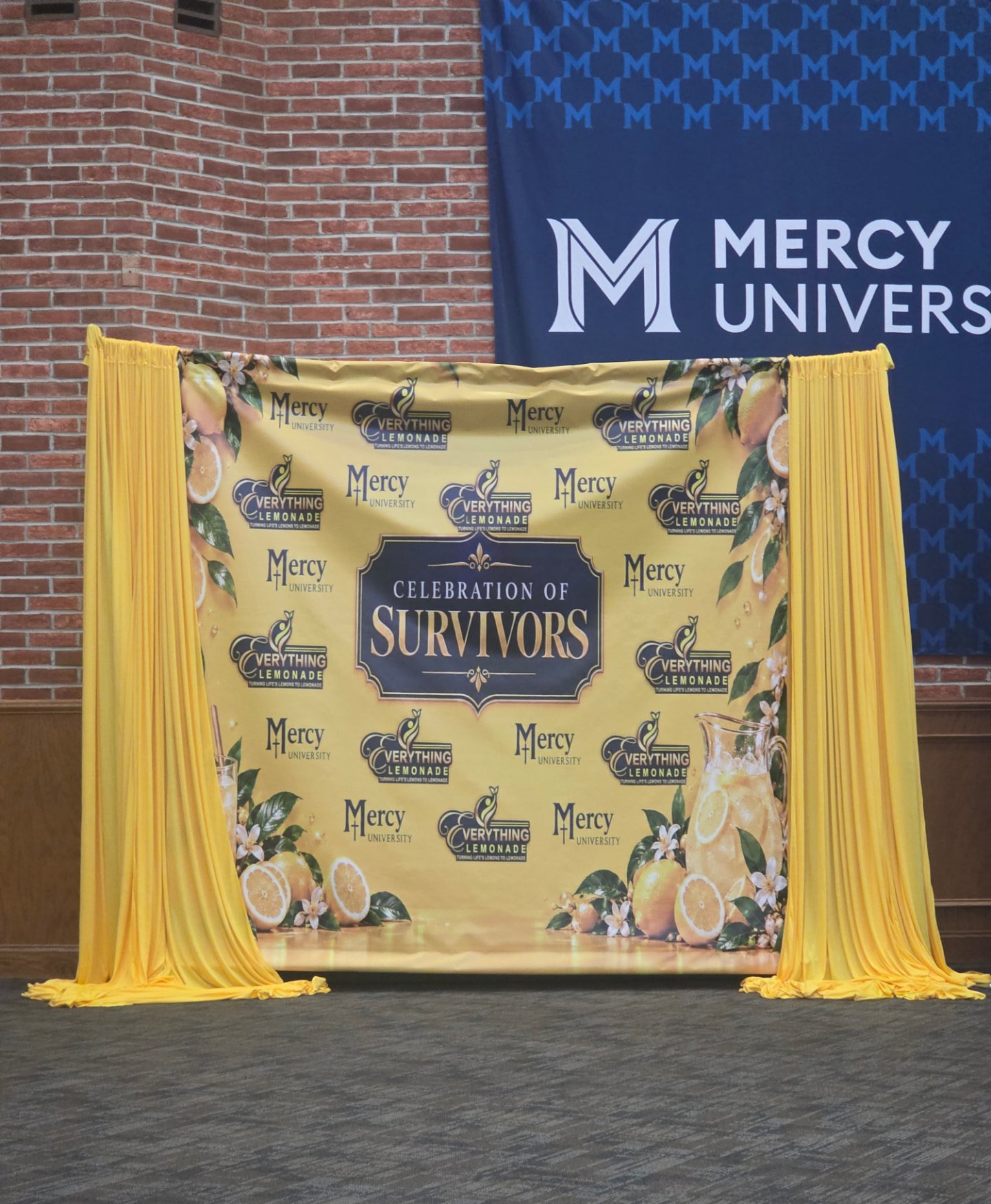 Celebration of Survivors backdrop at Mercy University